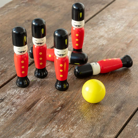 Wooden soldier skittles with yellow ball