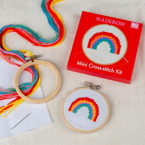 Mini cross-stitch kit for rainbow pattern in a red box