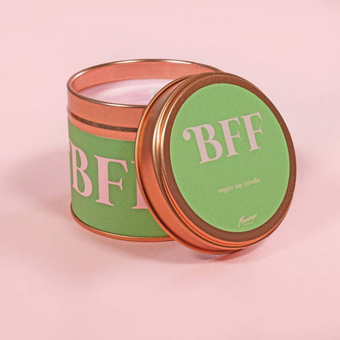 Rose gold tin candle with BFF slogan and pastel pink wax. 