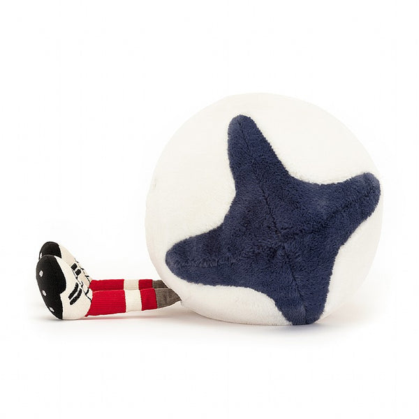 Soft fleece faxu fur rugby ball doll in white and navy. Smiley face and little legs with socks and boots. Cuddly plush toy.