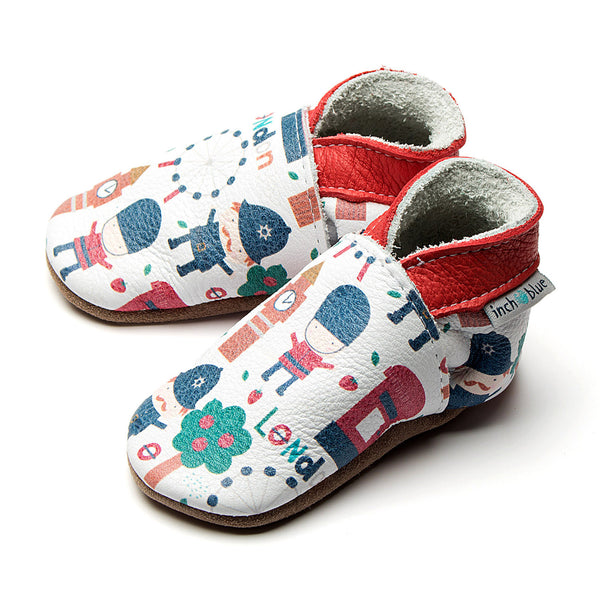 Handmade baby shoes with london prints in red, blue and white