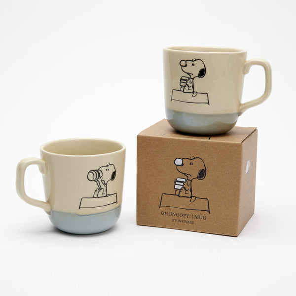 natural colour stoneware mug with blue glaze bottom, with snoopy drinking illustration, and kraft gift box
