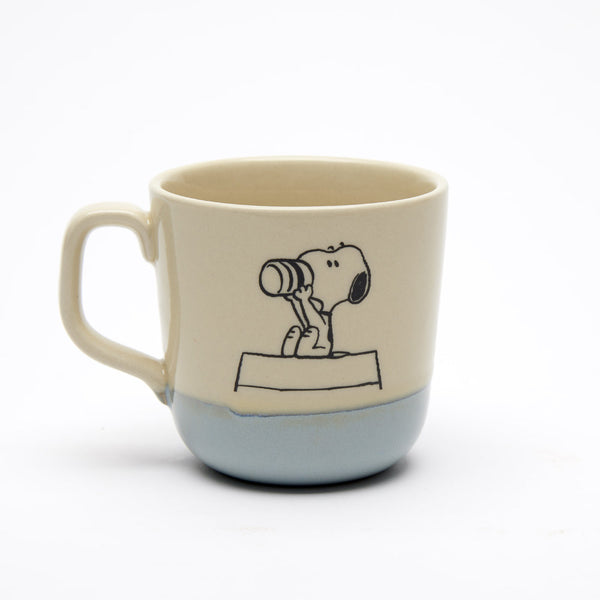 natural colour stoneware mug with blue glaze bottom, with snoopy drinking illustration