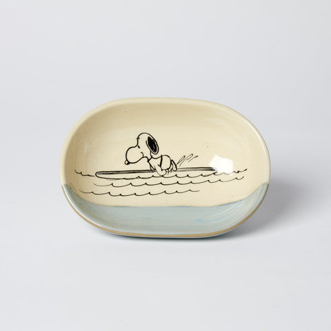 natural colour trinket / soap dish with blue glaze and snoopy surfing illustration