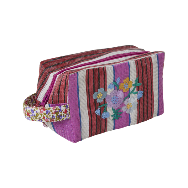 recycled plastic toiletry bag in multi colour stripe in red and purple with flower embroidery and floral handle 