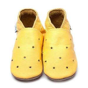Handmade baby shoes in yellow with star cutout