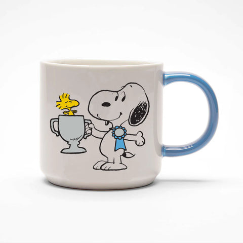 white ceramic mug with snoopy holding trophy, with blue handle