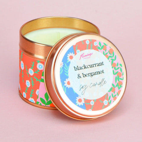 black currant & bergamot scented candle in colourful floral printed rose gold tin