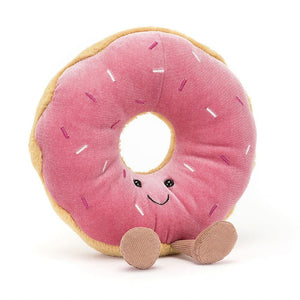 Soft plush doughnut doll made with fleece and corduroy fabric. Smiley face on pink icing and little legs. Cuddly soft toy.