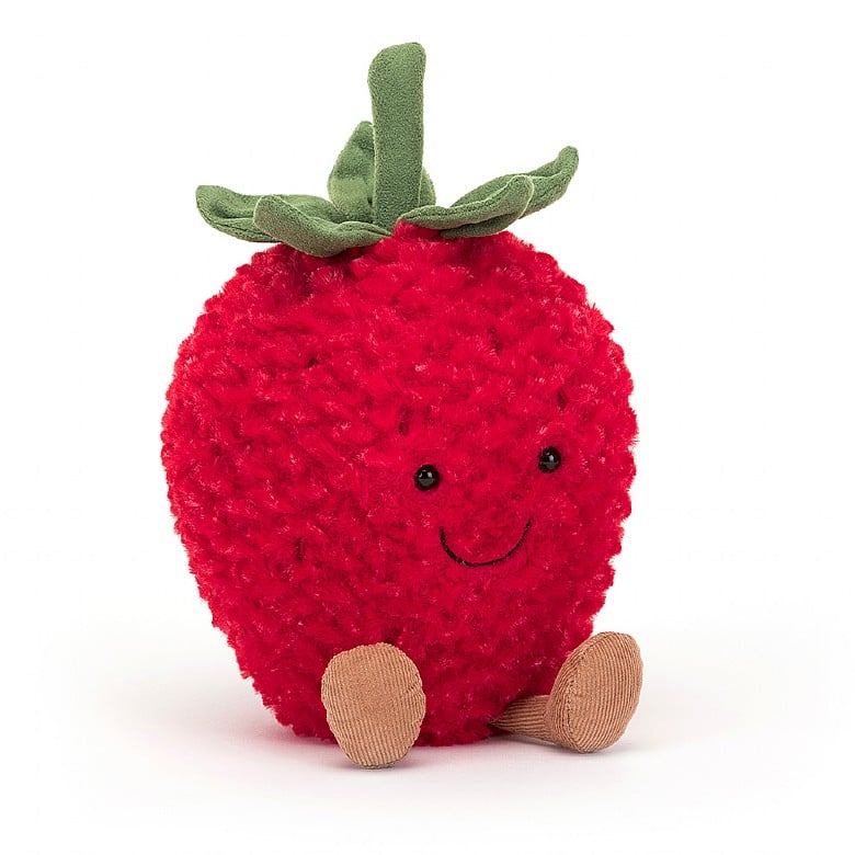 Soft fleece textured faux fur strawberry doll with smiley face, little legs and green stem and leaves. Cuddly plush toy.. 