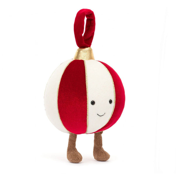 Soft velvet bauble plush toy in red, white and gold with smiley face and brown legs.