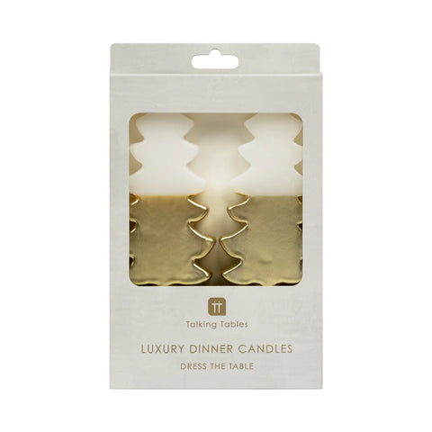 white and gold dinner candles in christmas tree shape