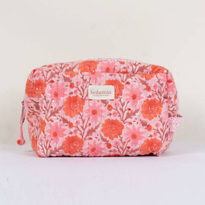 quilted cotton wash bag in pink with red and pink flower print
