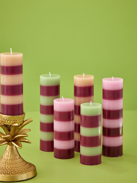 pillar candle with aubergine stripe, comes in orange, green and pink