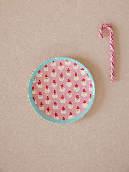 Melamine dessert plate in pink and santa face print with light blue edge