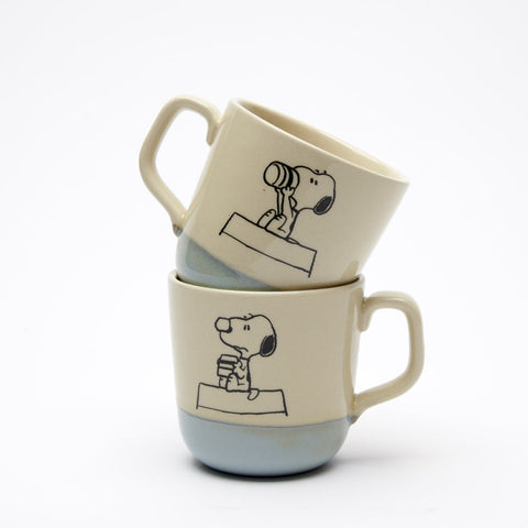 natural colour stoneware mug with blue glaze bottom, with snoopy drinking illustration