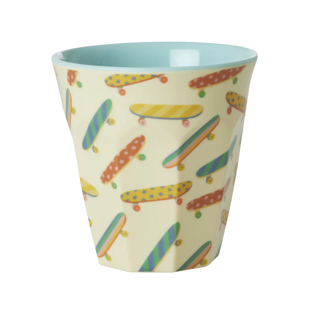 melamine cup with skateboard print in pastel colours outside and light blue inside