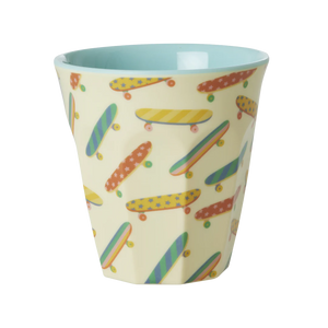 melamine cup with skateboard print in pastel colours outside and light blue inside