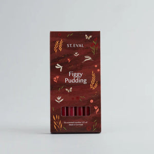 A set of six figgy pudding scented candles in a brown box with nature illustration 