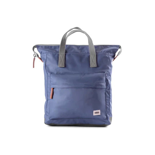cornflour blue back pack with grey carry handle and larg pocket 