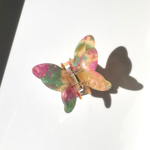 pink, green and yellow marble acetate hair claw clip in butterfly shape