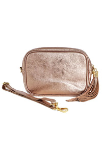 Champagne gold leather cross body bag with detachable strap and gold hardware