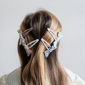 grosgrain covered hair clips with floral and gingham bows