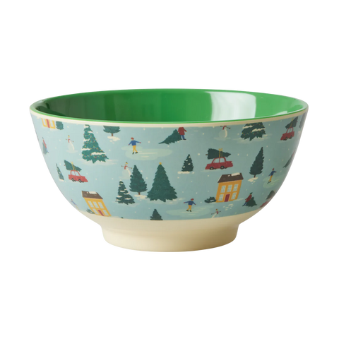 Melamine bowl with light ble christmas village scene print on outside and green inside