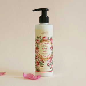 rose body lotion in a bottle with rose illustration and black pump