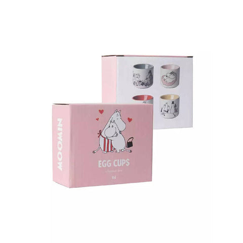 A set of 4 egg cups with moomin characted illustrations in a pink box 