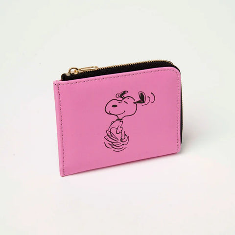 Pink coin purse with an illustration of snoopuy jumping with joy and black and gold zip