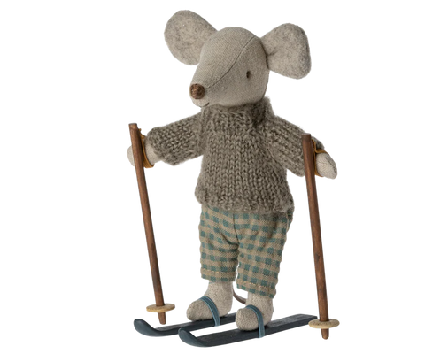 Little stuffed mouse doll wearing grey jumper and green gingham trousers, and ski 