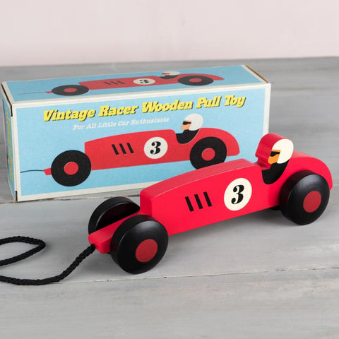 vintage style wooden racing car toy in red 