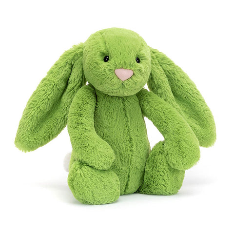 Soft faux fur bunny rabbit doll in apple green with white pompom tail. Cuddly plush toy. 